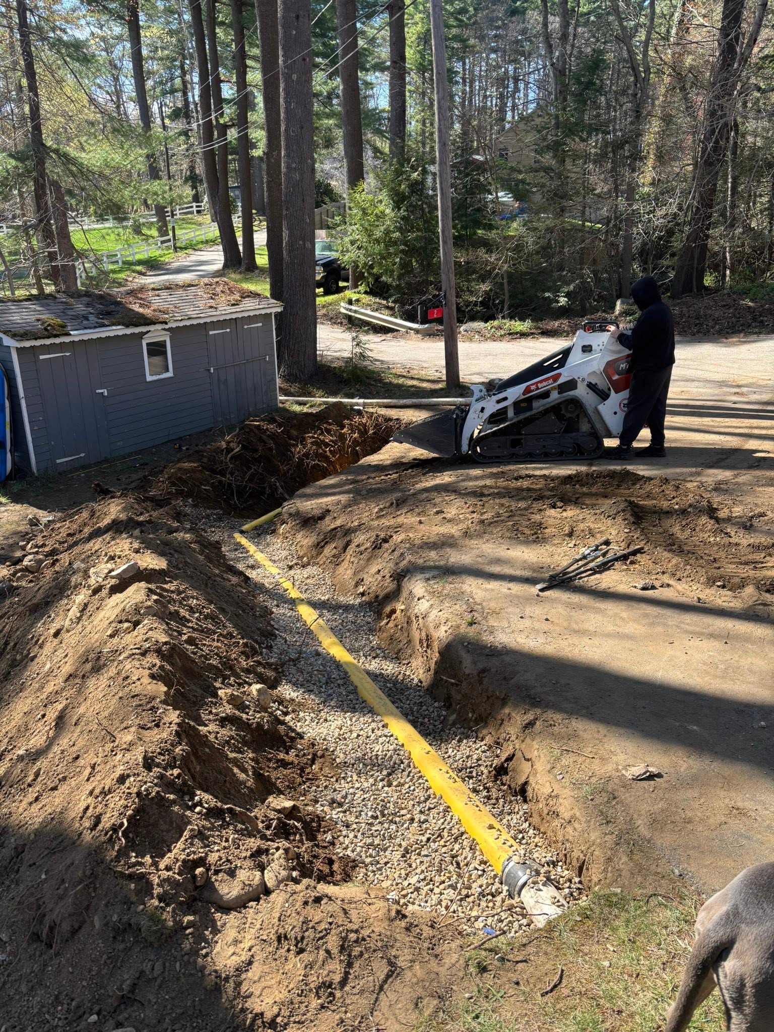 Drain pipe being buried deeper in the ground